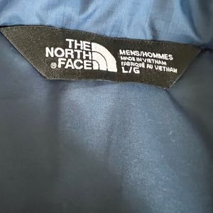 Adult blue puffy North Face vest
